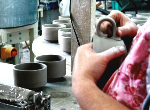 Handles being applied to soup mug.