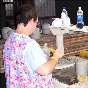 Loose clay particles are removed prior to drying process.