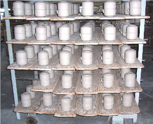 Soup cups dry for 24 hours before glaze is applied.