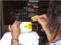 If product has decsls, they are applied after the firing, then the product is fired again at 600 degrees Fahrenheit.