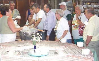 Leadless glaze procedure explained to tour group.