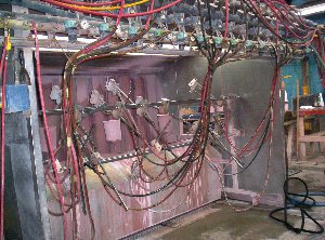 Spray unit where colors are applied to chinaware.