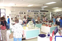 A group of buyers searching for bargains at The Hall Closet.